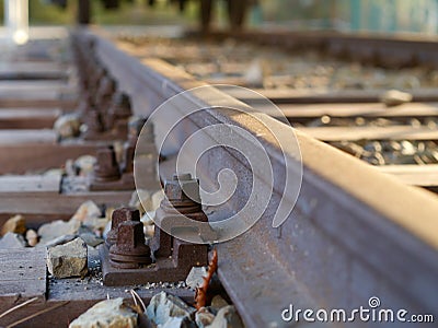 European rail construction with a rusty and nut top view Stock Photo