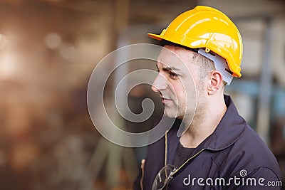 European Russian worker profile image handsome gentleman look wearing helmet safety suit work in factory Stock Photo