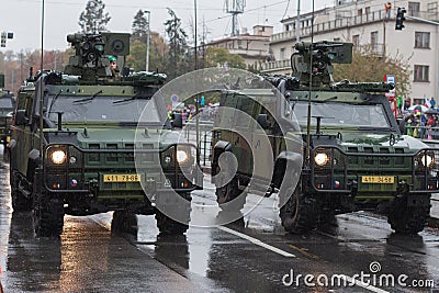 Soldiers of Czech Army are riding Iveco LMV on military parade Editorial Stock Photo