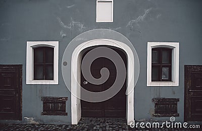 European style facade with rolling shutter on windows Stock Photo