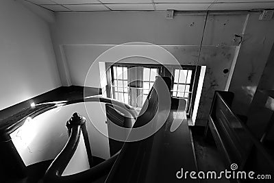 European style small attic with rotating stairs black and white image Stock Photo