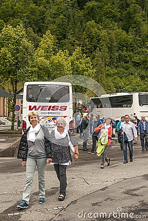 European tourists getting off the bus Editorial Stock Photo