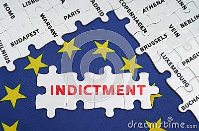 The EU flag has city name puzzles and puzzles with the words - Indictment Stock Photo