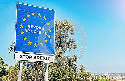 European Union flag with message to Revoke Brexit Article 50 Stock Photo