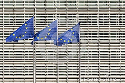 European Union flags in front of European Commission headquarters building, Berlaymont building. Editorial Stock Photo