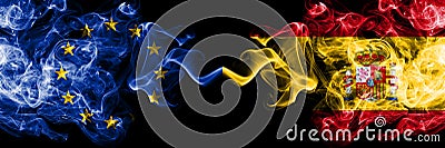 European Union vs Spain, Spanish smoke flags placed side by side. Thick colored silky smoke flags of EU and Spain, Spanish Stock Photo