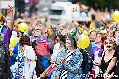 Europride 2014 Lady in green party hat Editorial Stock Photo