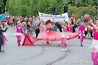 Europride 2014 Lady in red on parade in Oslo Editorial Stock Photo
