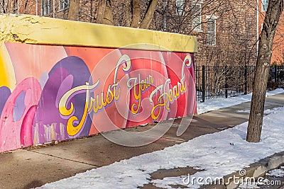 Evanston, IL/USA - 01-13-2019: Colorful inspirational message painted on cement wall Editorial Stock Photo