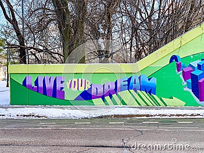Evanston, IL/USA - 01-13-2019: Colorful mural painted on cement wall with inspiring message Editorial Stock Photo