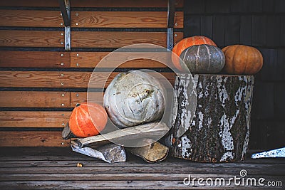 On the eve of Halloween, pumpkins near the house are decorated w Stock Photo