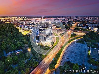 Evening aerial view of Aupark tower and Petrzalka with junction with beatiful sky in Bratislava Stock Photo