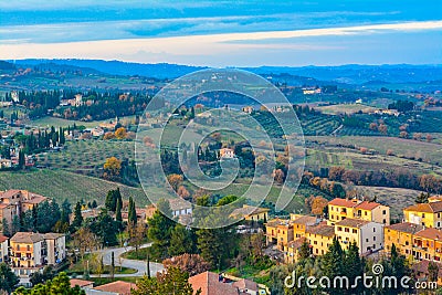 Evening afterglow of the sun on a Tuscan hillside at San-Gimignano, Italy. Stock Photo