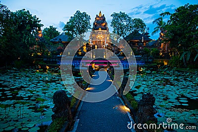 Evening atmosfere iof the Pura Saraswati Temple with beatiful lotus pond, Ubud, Bali, Indonesia Stock Photo