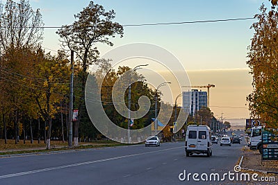 Evening city road at sunset during golden autumn. Background. October 22, 2021 Balti Moldova Editorial Stock Photo