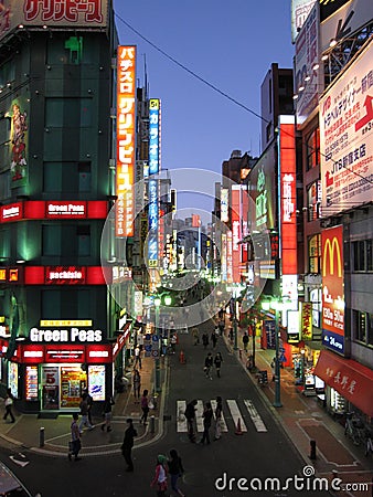 Evening city shops neon lights in central Tokyo Editorial Stock Photo
