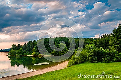 Evening clouds over the shore of Lake Marburg, Codorus State Par Stock Photo