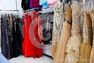 Evening dresses on hangers Stock Photo