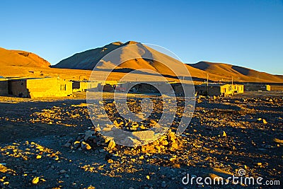 Evening landscape and accomodation buldings at Laguna Colorada, Altiplano area, Bolivia, South America Stock Photo