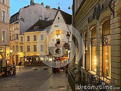 Evening light street city houses in medieval town old Tallinn travel to Estonia Editorial Stock Photo