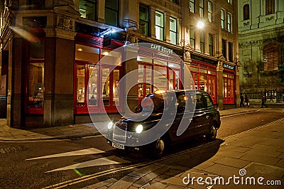 Evening London CafÃ© and Taxi Editorial Stock Photo