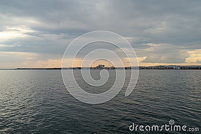 Evening overcast sky and the rays of the sun Stock Photo