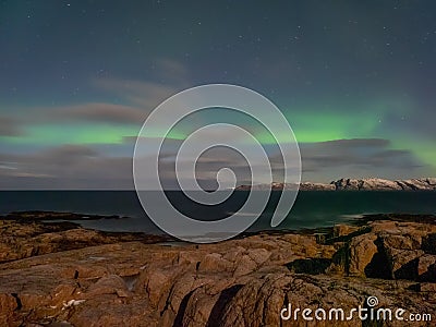 Evening polar landscape with the Aurora Borealis Stock Photo