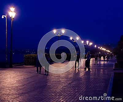 Evening promenade in the city of Samara, Russia. Street lighting at dusk Editorial Stock Photo