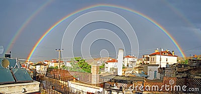 Evening rainbow over Mustafapasha Stock Photo