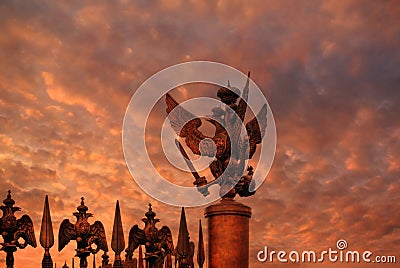 Evening in Saint Petersburg. View of double eagle on the gate on Palace Square at sunset in St. Petersburg Stock Photo