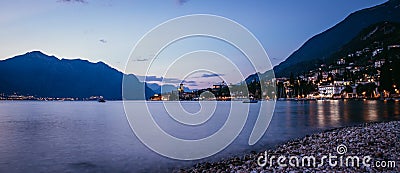 Evening scene at lago di garda: Beach, lake and village, Panorama Stock Photo