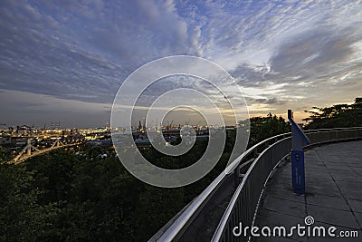 Evening scenery of seaport with amazing colourful cloudy sky Stock Photo