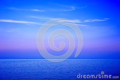 Evening seascape with wispy clouds Stock Photo