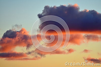 Evening sky with fluffy colorful clouds. Stock Photo