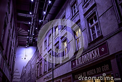 Evening street of old houses in the violet light of street lamps. Reconstruction of pre-war houses in the museum of the Second Editorial Stock Photo