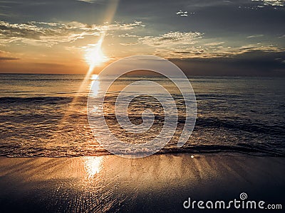 Evening sunset on the beach. Can be use as background. Stock Photo