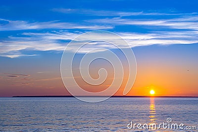 Evening sunset over sea horizon Stock Photo