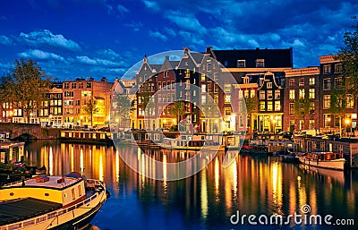 Evening town Amsterdam in Netherlands on bank Stock Photo