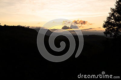 Evening Twilight gold Sky sun set on mountain Background. Stock Photo