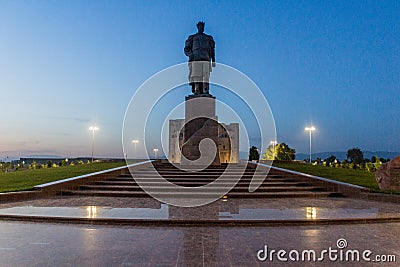 Evening view of Amir Temur Tamerlane statue in Shahrisabz, Uzbekist Stock Photo