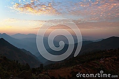 Evening view of blue horizons in Himalayas and red clouds Stock Photo