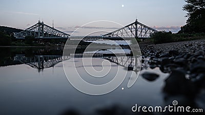 Evening view of the Loschwitz Bridge in Germany over river Elbe with moon in the sky Stock Photo