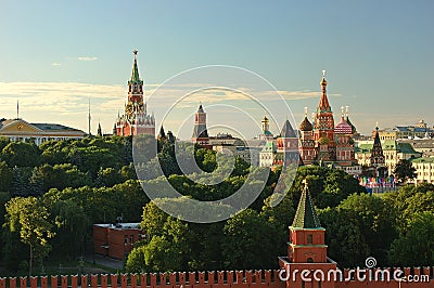 Evening view on Moscow Red Square Kremlin towers red square wall stars and Clock Kuranti Saint Basil Cathedral church. Panorama fr Stock Photo