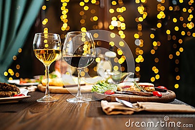 Evening wine celebration dinner on blurry lights Stock Photo