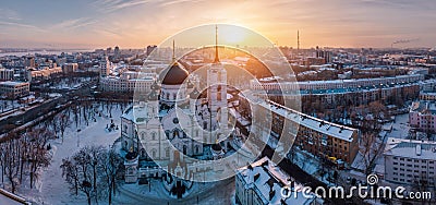 Evening winter Voronezh panoramic cityscape. Tower of management of south-east railway and Annunciation Cathedral at sunset Stock Photo