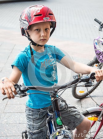 The event `bicycle day`, Bicyclists, adults and children, their portraits. Editorial Stock Photo