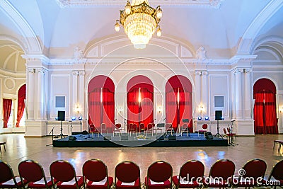 Events hall with stage prepared for classic music concert Stock Photo