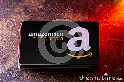 Amazon Gift Card on Top of A Stack of Credit Cards Editorial Stock Photo