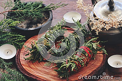 Evergreen cleansing sticks for Yule winter solstice Christmas celebration Stock Photo