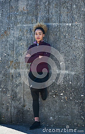 Every day is a step closer to your goal. an attractive young woman out for a run. Stock Photo